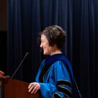 Provost Mili at the podium